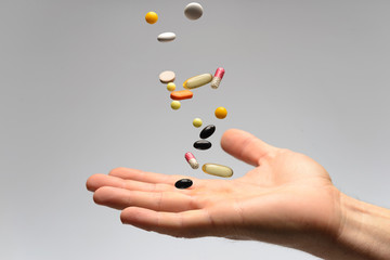 Medicine pills in hand