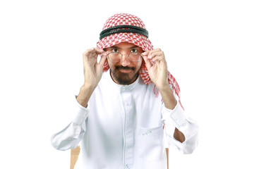 Arab man portrait wearing keffiyeh isolated on white background. Muslim man wearing his glasses.