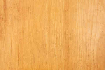 Naklejka premium Yellow wooden background with brown splashes. Wood texture.