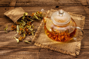 Linden tea. Dry fragrant flowers. Sunny morning breakfast. Hot drink to strengthen the immune system, alternative medicine