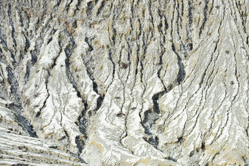 View from above, stunning aerial view of dried lava that forms a beautiful natural texture under the Mount Bromo. Cemoro Lawang, East Java, Indonesia.