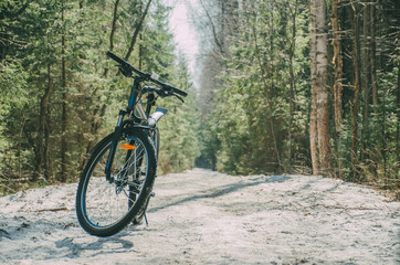 mountain bike on a snow-covered path
