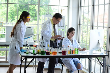 Scientists are working in science labs.Close-up of a scientist, scientist  in a laboratory doing research, microbiological analysis, medicine.