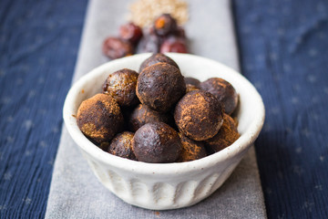 Black truffle chocolate energy protein sweet balls. Vegan cocoa dieting raw dessert.