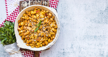 Cinnamon apples baked in pan. Sweet vegan dessert.