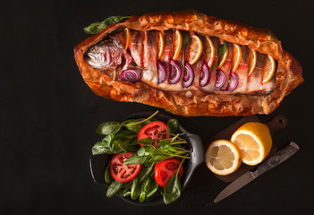 Fish Salmon baked in a dough. The view from the top