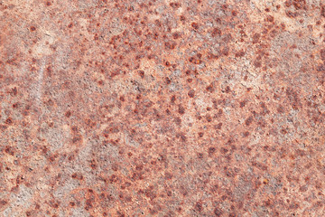 rusty background with elements of corrosion in several places with rusty texture of old metal