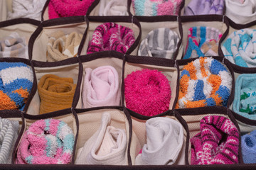 Organization of storage of socks in a chest of drawers, wardrobe.