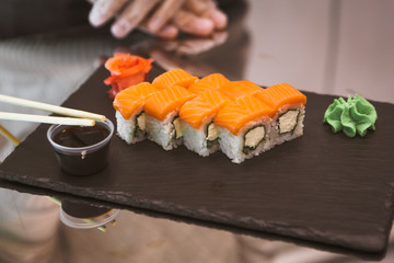 Classic roll philadelphia on black slate plate