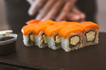 Classic roll philadelphia on black slate plate