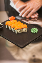 Classic roll philadelphia on black slate plate