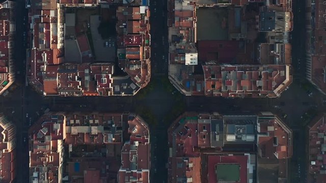 AERIAL: Overhead Drone Shot of Typical City Blocks in Barcelona, Spain in beautiful Sunlight 