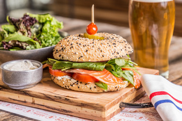 salmon  sandwich with salad