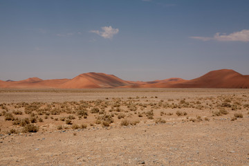 Fototapeta na wymiar View Of Desert Against Cloudy Sky