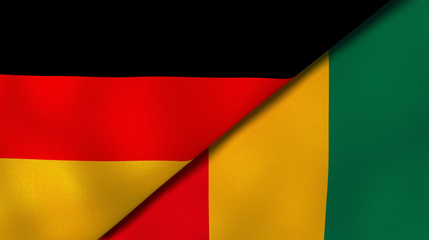Obraz premium The flags of Germany and Guinea. News, reportage, business background. 3d illustration