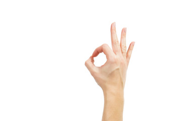 Top view: female hand with clean healthy skin on a white isolated background showing gestures