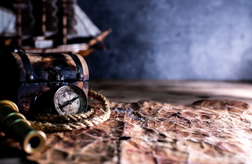 Columbus Day. Pirates and treasure with vintage worldmap and discovery of old equipment. Copy space...