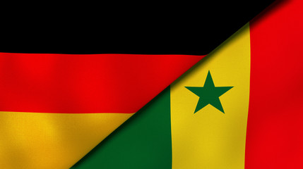 The flags of Germany and Senegal. News, reportage, business background. 3d illustration