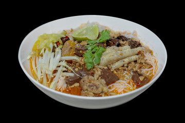 Nam ngiao Rice Noodle, Noodles with Spicy Pork Sauce on black background