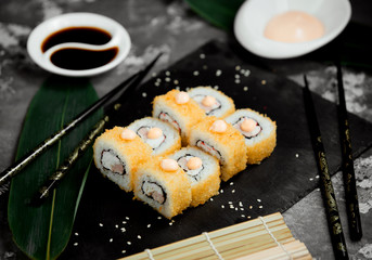 sushi set with yellow caviar fish and rice