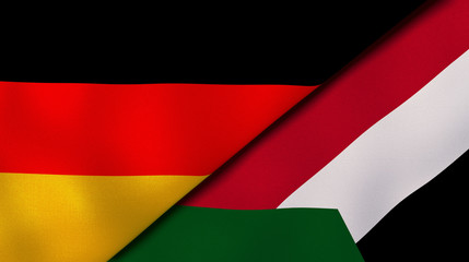 The flags of Germany and Sudan. News, reportage, business background. 3d illustration