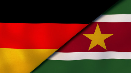 The flags of Germany and Suriname. News, reportage, business background. 3d illustration