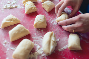 Preparation of the dough for baking homemade rolls - shallow depth of field