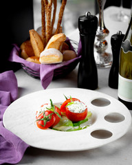 tomato with sauce and vegetables