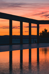 sunset at the pool during the summer holidays