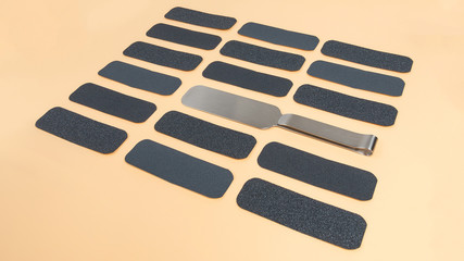 Set of cosmetic sandpaper on a beige background