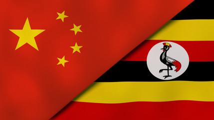 The flags of China and Uganda. News, reportage, business background. 3d illustration