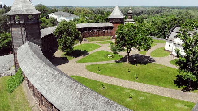 Historic Wooden Fortification With Walls And Watchtowers