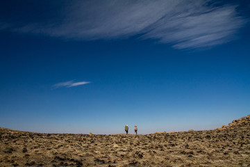 hikers in mountain landscape