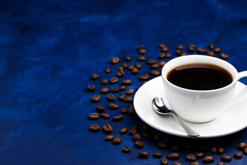 hot black coffee on a blue background
