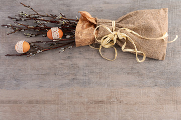 A bouquet of willow wrapped in burlap. Spring and Easter concept. Copy space.