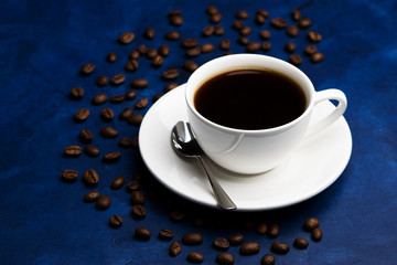 hot black coffee on a blue background