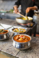 traditional Indian dishes standing in the restaurant
