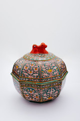 earthenware pottery made of clay fired to a porous state that can be made impervious to liquids by the use of a glaze.