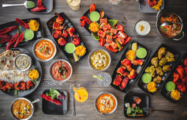 various Indian dishes, top view over the table