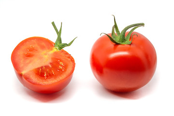 whole and cut tomatos isolate on white background