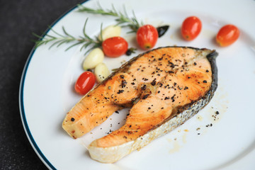 cooked salmon steak with herbal ingredient for health yeating in daily lfie at home 