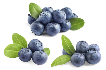 Set of tasty ripe blueberries with leaves on white background