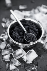 Fototapeta na wymiar Some fresh Black Caviar (selective focus; close-up shot)