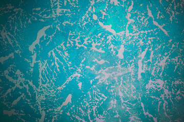 patches of white paint on a blue background, abstract texture