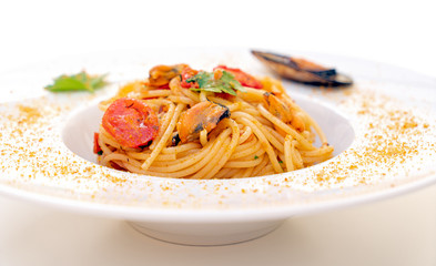 spaghetti with mussels bottarga fish and cherry tomatoes