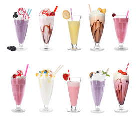 Set of glasses with different protein shakes on white background