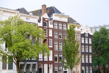 Naklejka premium Old traditional buildings in Amsterdam, Netherlands