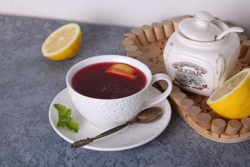Hot red berry tea with raspberry and lemon