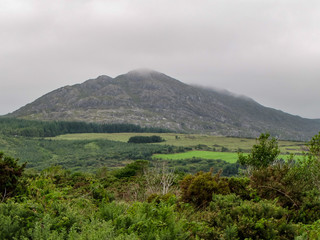 Fototapeta na wymiar Irish Mountain with Clouds Descending