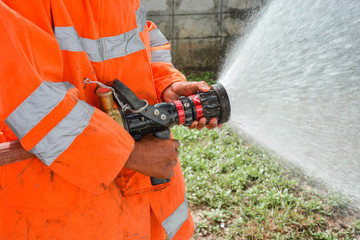 Fototapeta premium Firefighters Extinguishing House Fire